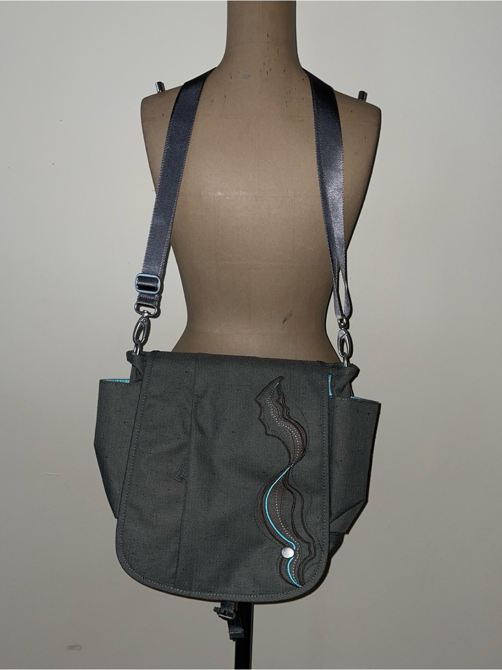 Haiku Gray Crossbody Bag with Teal Accent 12” lots of pockets